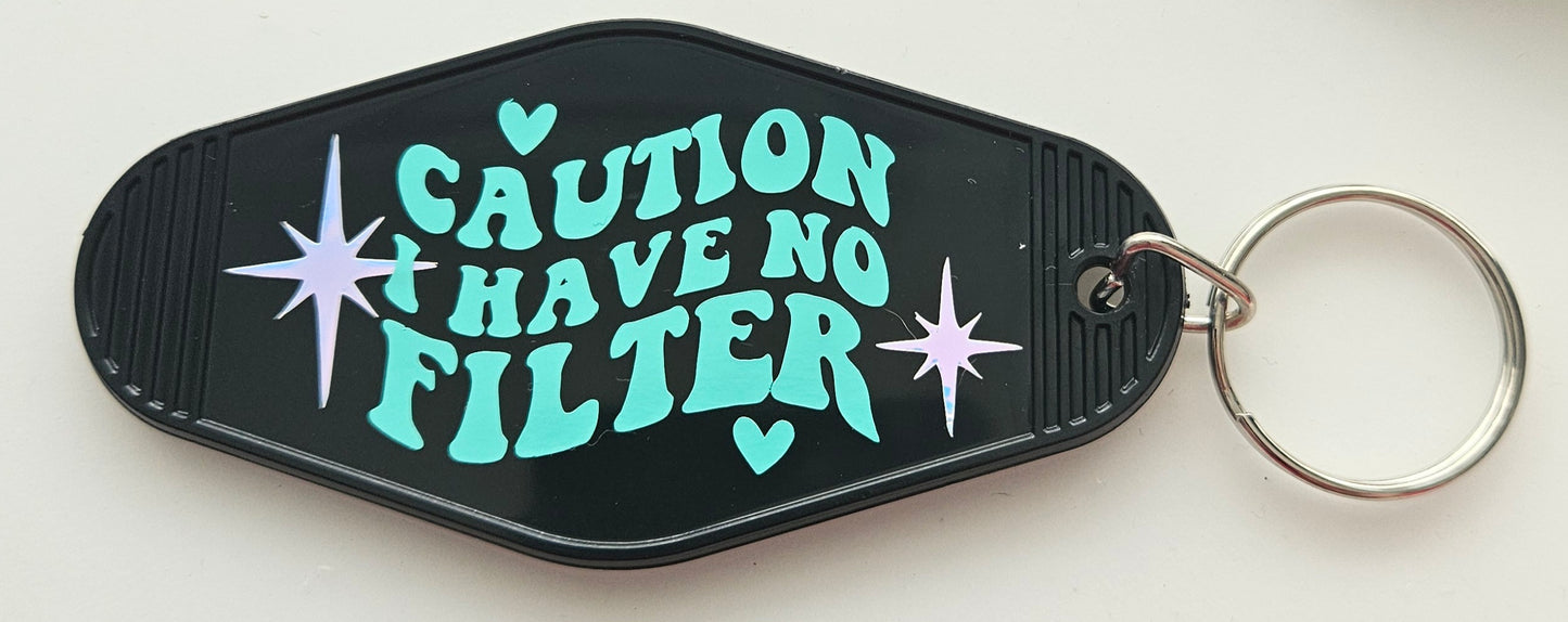 'Caution..' keyring